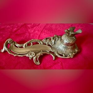 Victorian Antique Brass Inkwell featuring a bird perched on a nest.